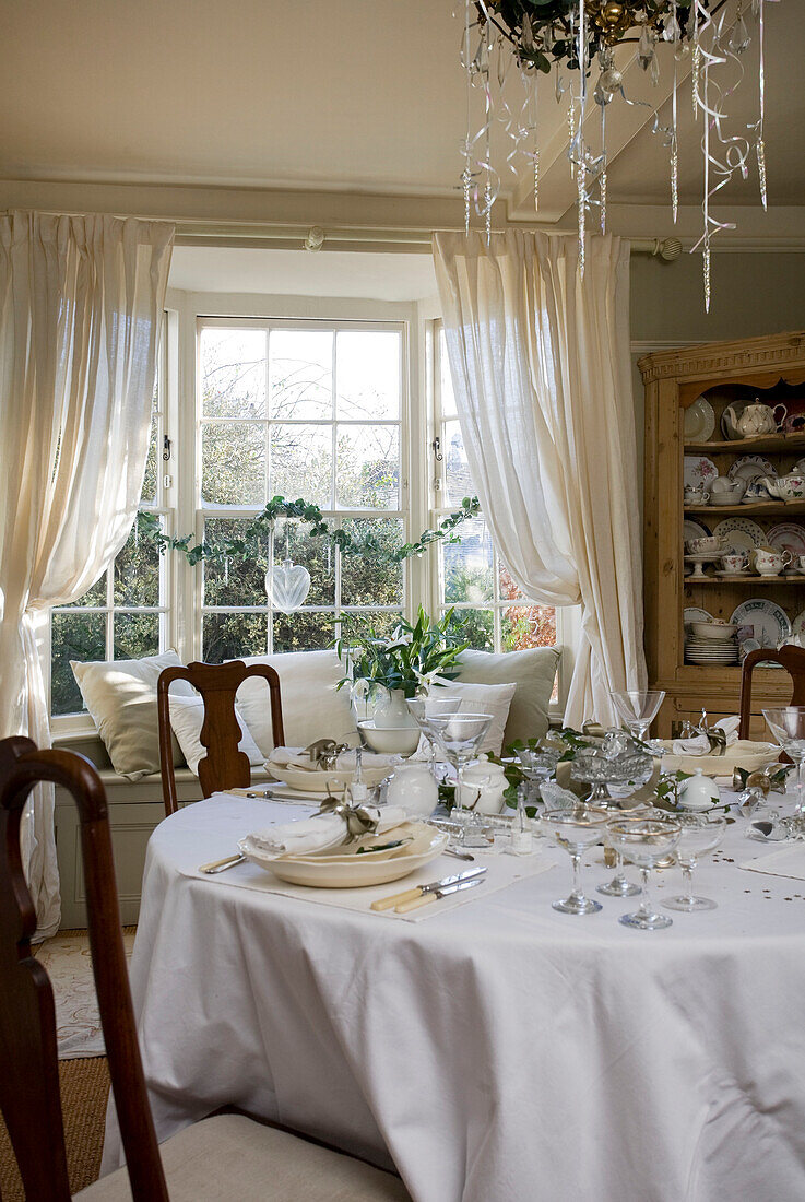 Dining table set for Christmas dinner in Tenterden home, Kent, England, UK