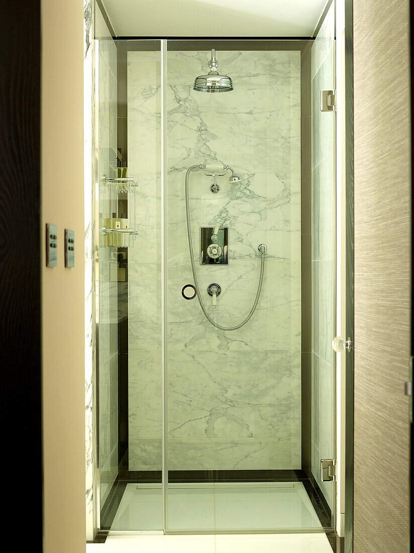 Glass shower cubicle in London townhouse, UK