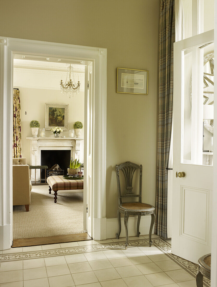 Door frame and hallway in East Sussex country house England UK