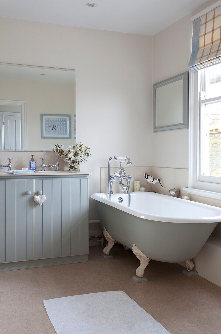 Freestanding bath in light blue Epsom home Surrey UK