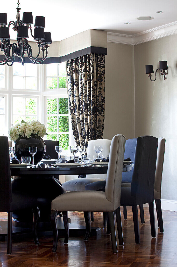 Black and gold dining room in Hendon home London UK