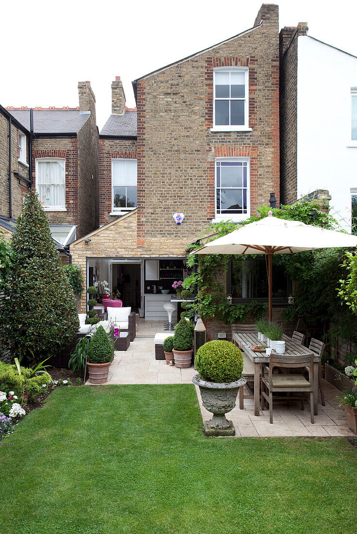 View into garden extension of London home from garden, UK