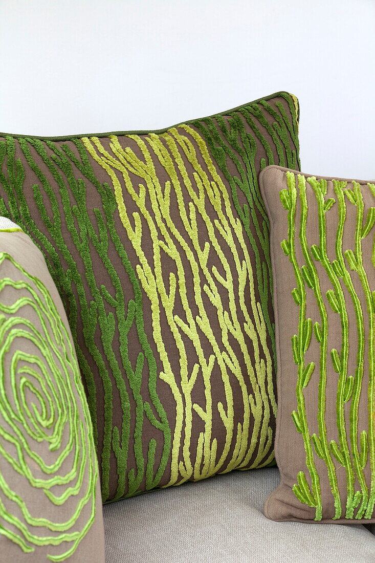 Patterned cushions in contemporary London home, England, UK