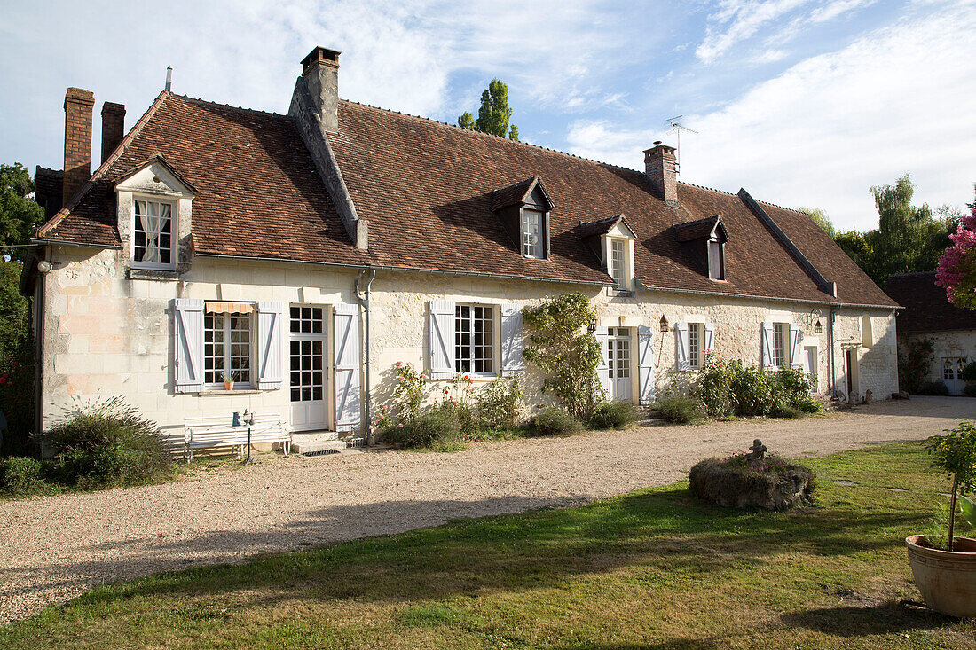 Sunlit exterior of French farmhouse in the Loire, France