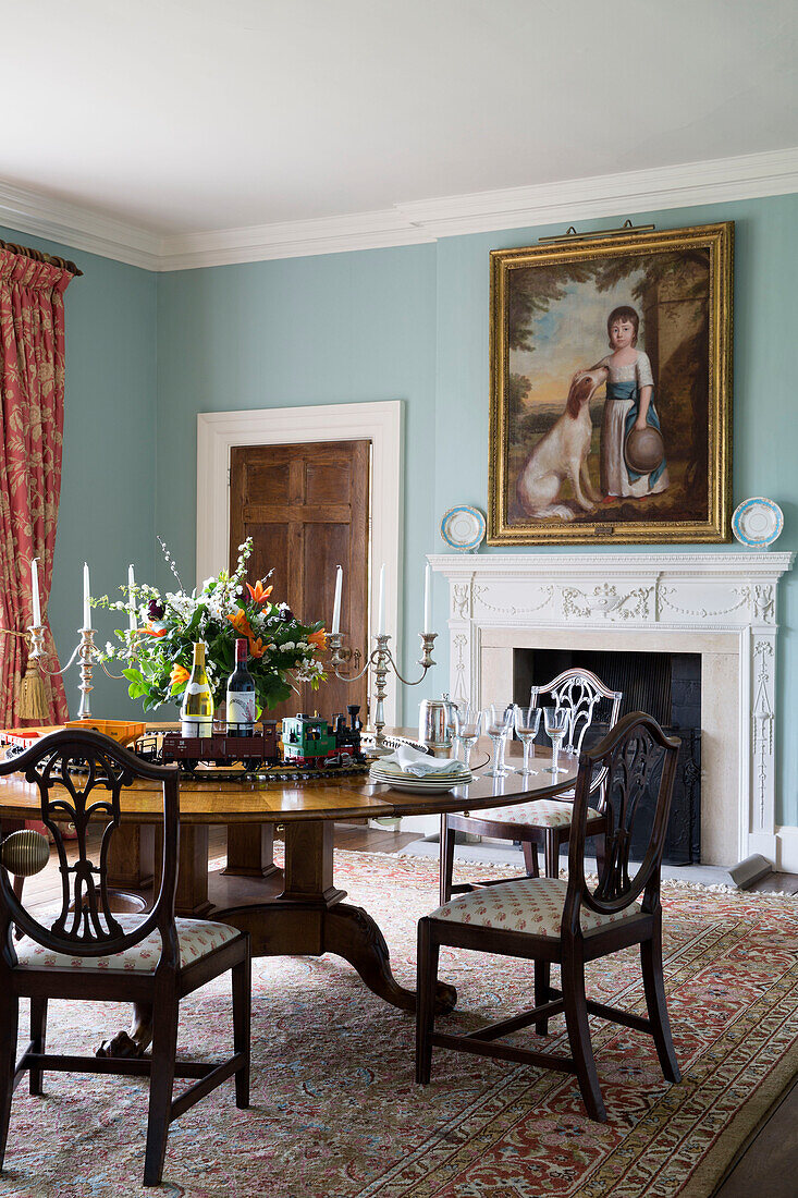 Antique dining table and chairs in Grade II listed Georgian country house in Shropshire England UK