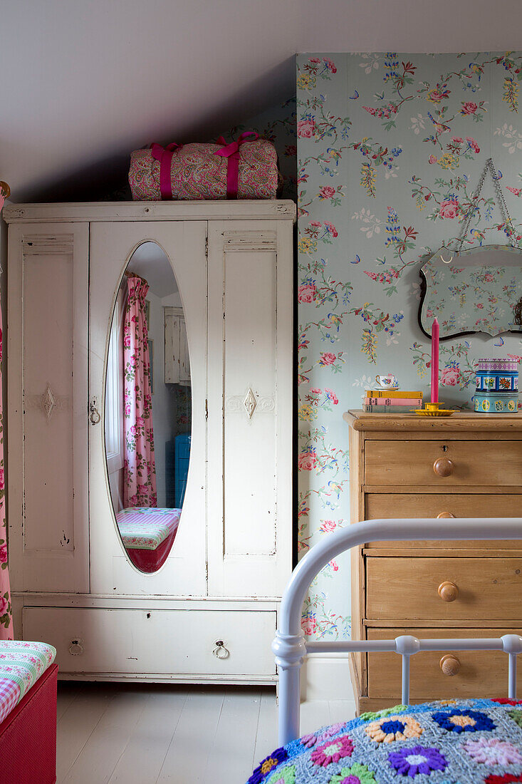 Vintage wardrobe and wooden chest of drawers in Kidderminster cottage Worcestershire England UK