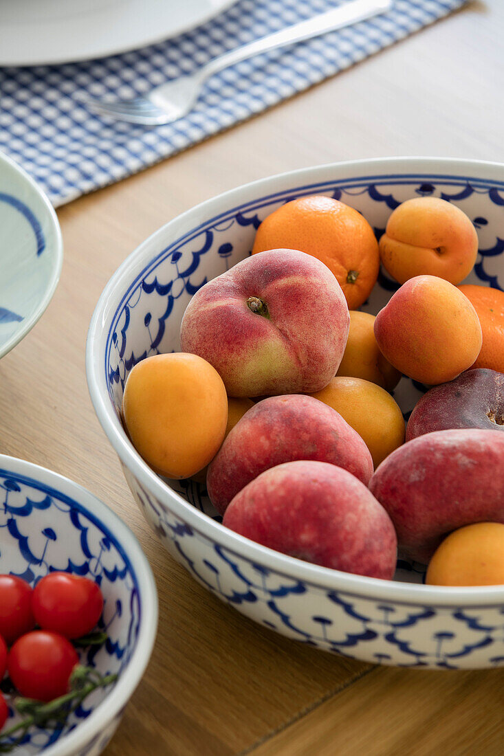 peaches in fruit bowl on table in Grade II listed cottage Cornwall UK