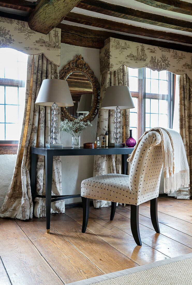Dressing table and chair in windows with curtain pelmets in Kent farmhouse UK