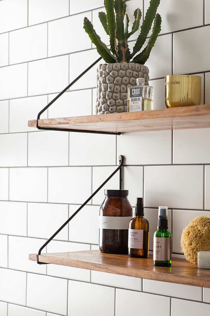 Simple shelves and white metro tiles in Victorian family home Manchester UK