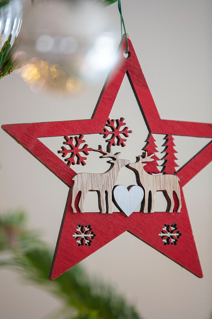 Red reindeer star decoration in Surrey cottage UK