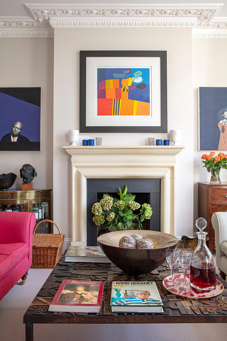 Modern art with decanter on coffee table in Southwest London home UK