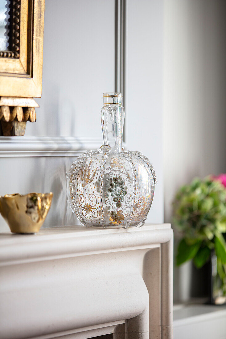 Crystal vase on mantlepiece in London home UK