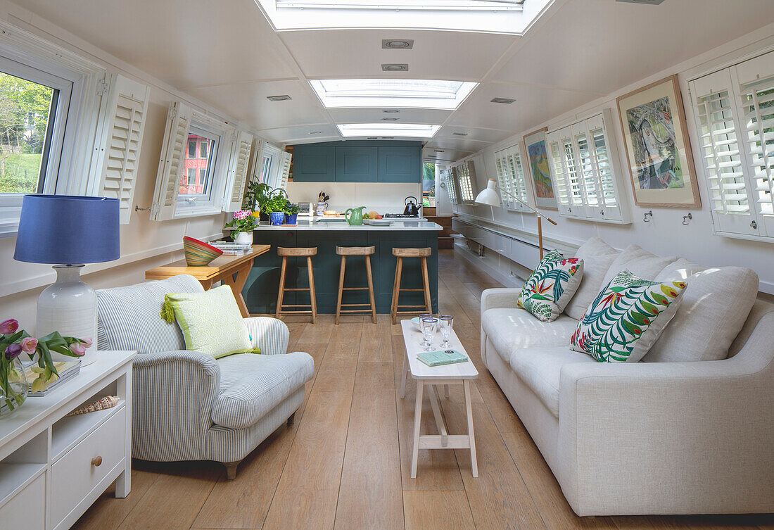 Cozy seating area with skylights on a houseboat