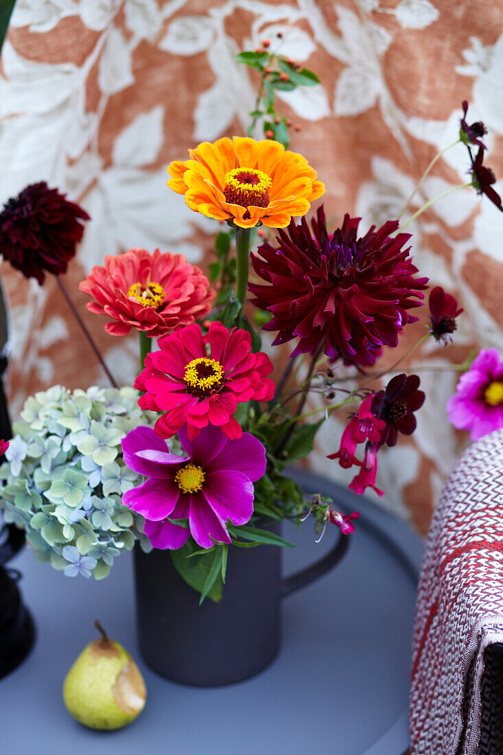 Colorful bouquet of flowers with zinnias and hydrangeas