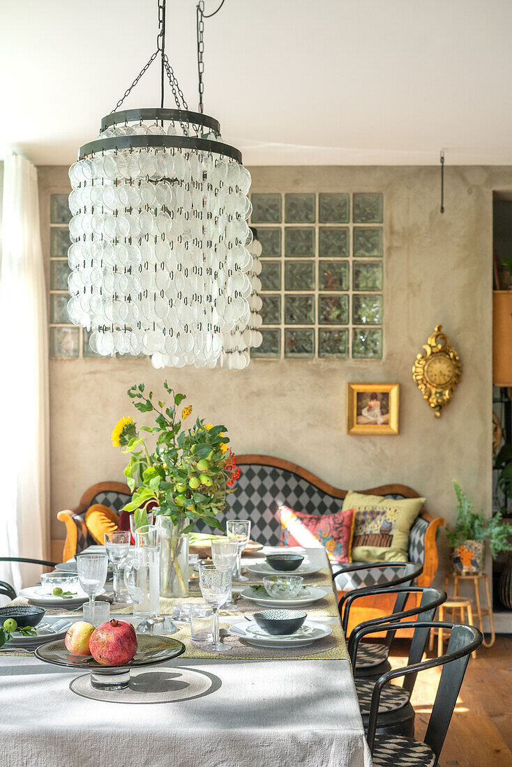 Set dining table, chandelier and glass bricks