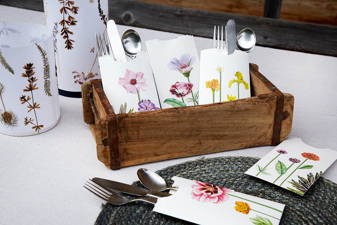 DIY paper cutlery bags with a floral motif