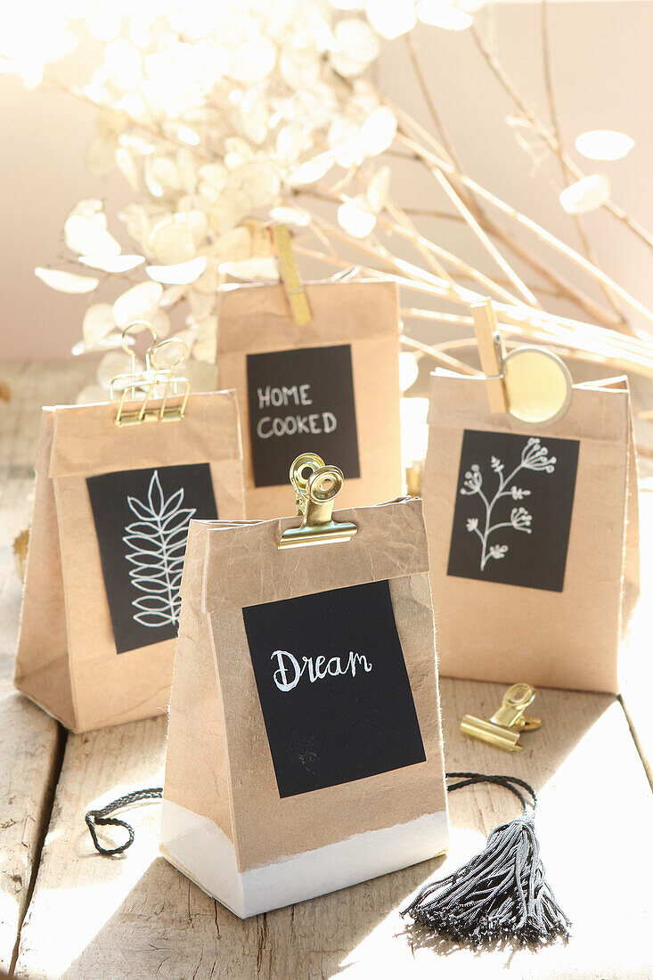DIY gift box made from old milk cartons with black labels