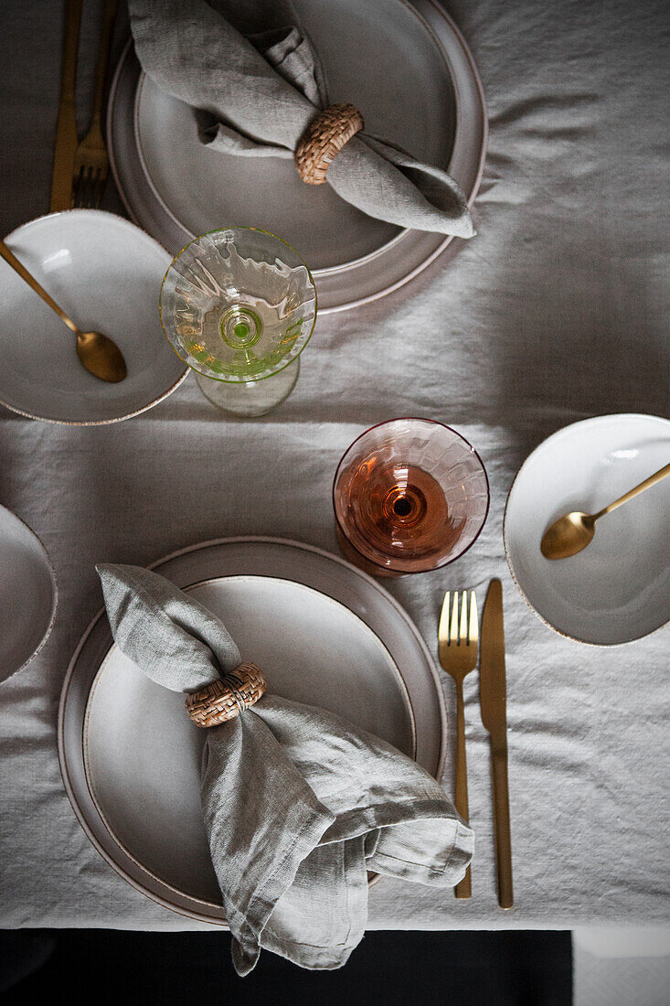 Table set in natural colors with linen tablecloth
