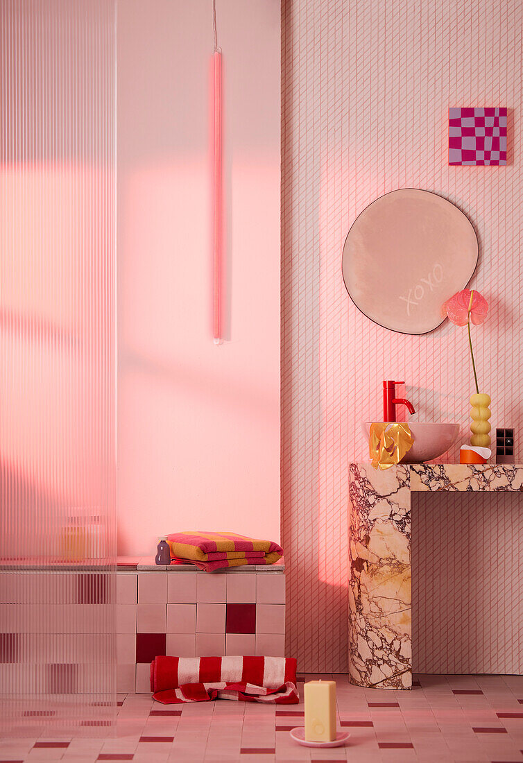 Bathroom in pink tones with modern marble sink