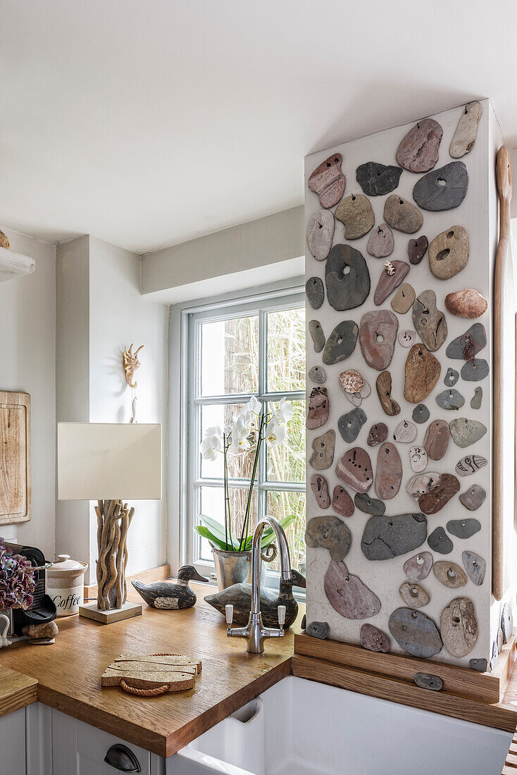 Rock collection as wall decoration in the kitchen