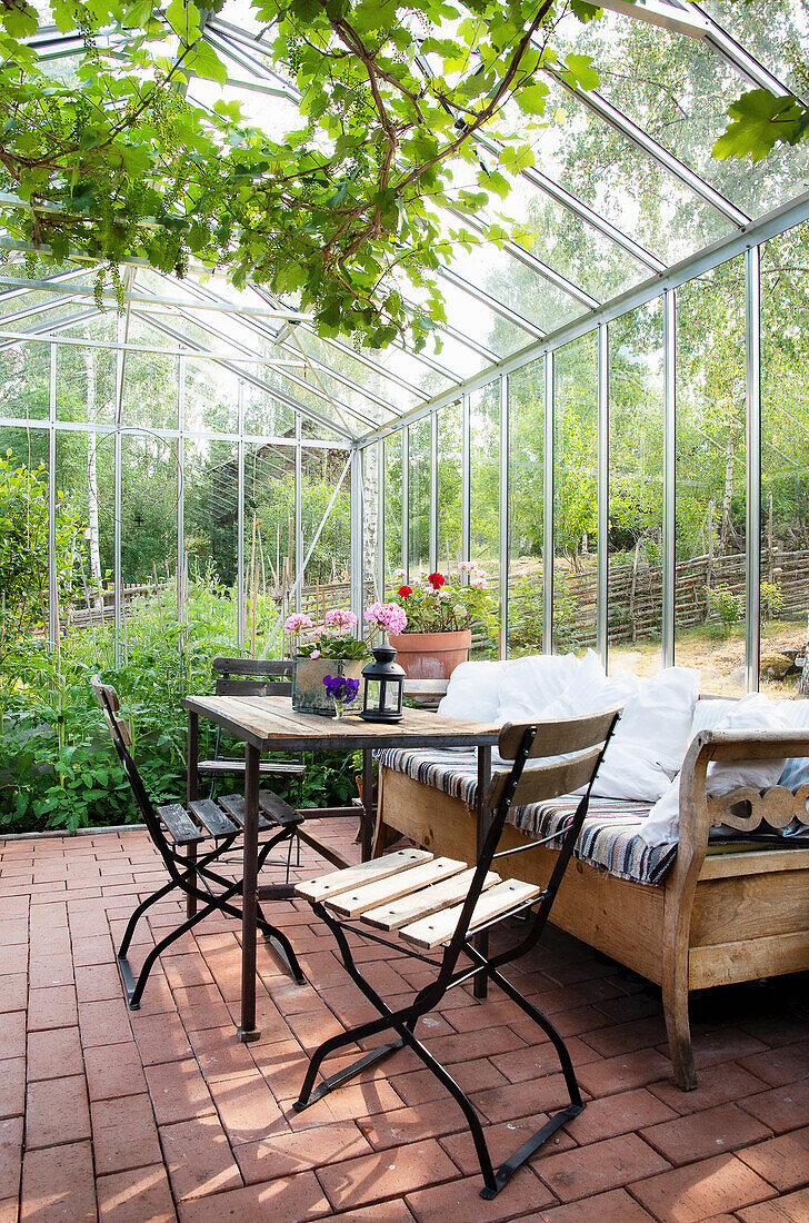 Cosy seating area in the greenhouse