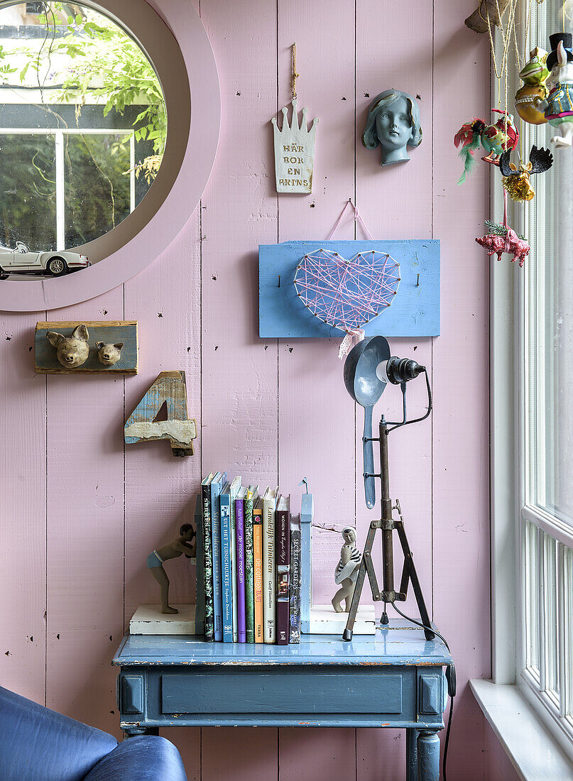 Pastel pink wall with decorations