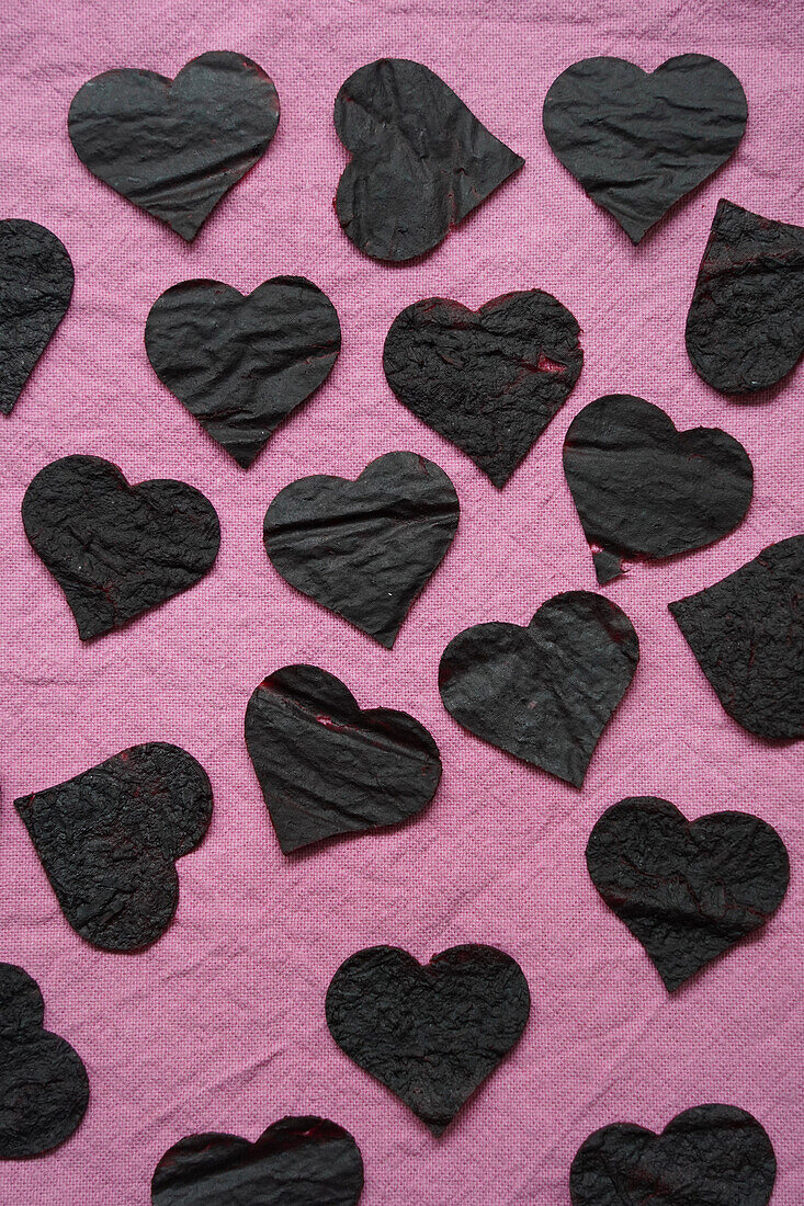 Dried sloe fruit leather, fabric dyed in sloe broth