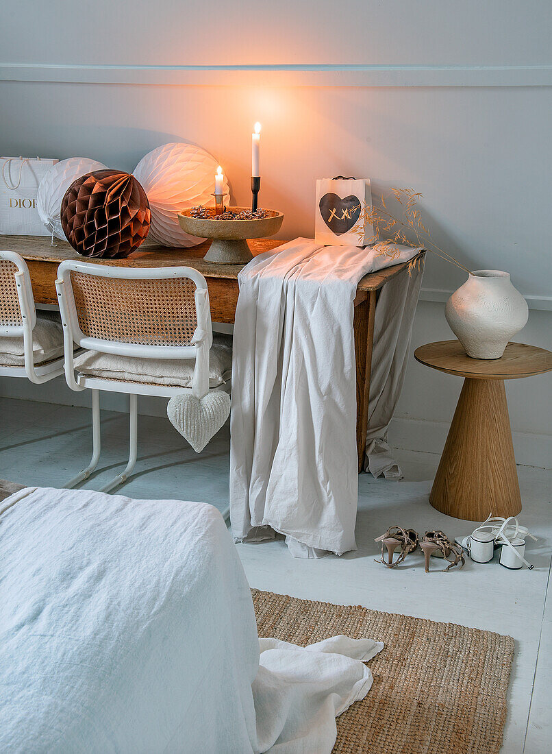 Wooden table with candles and decoration in the bedroom