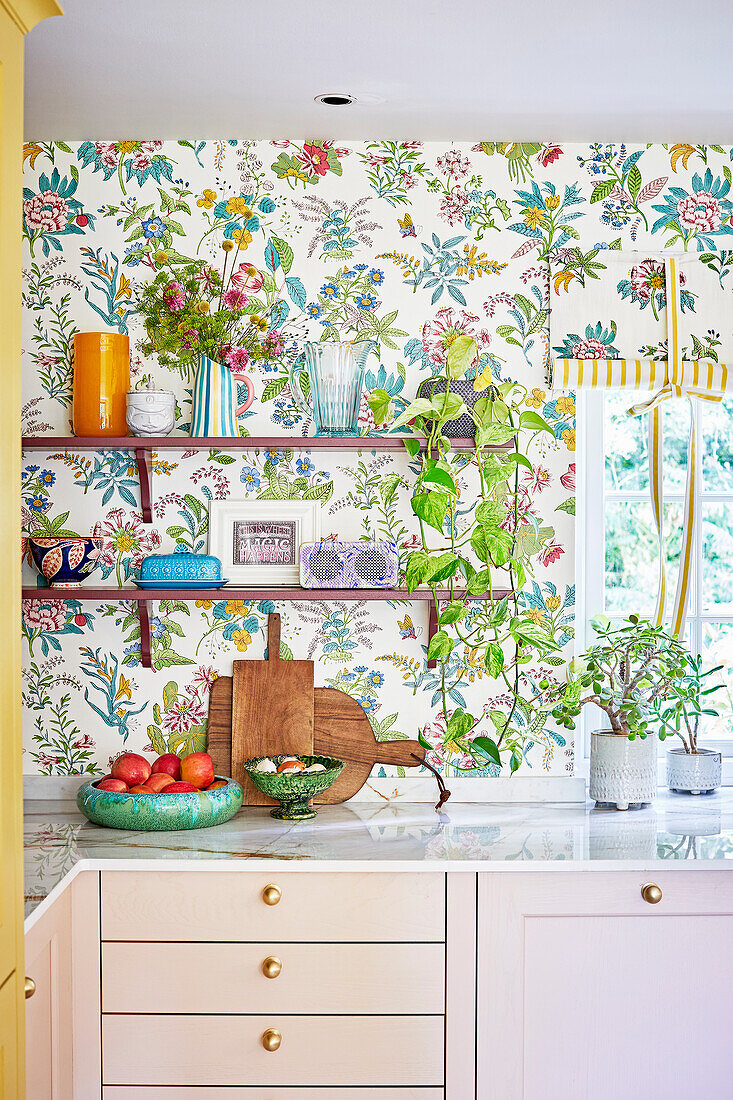 Kitchen with flowered wallpaper