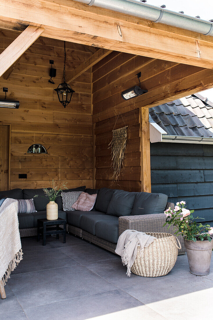 Covered terrace with cozy lounge area