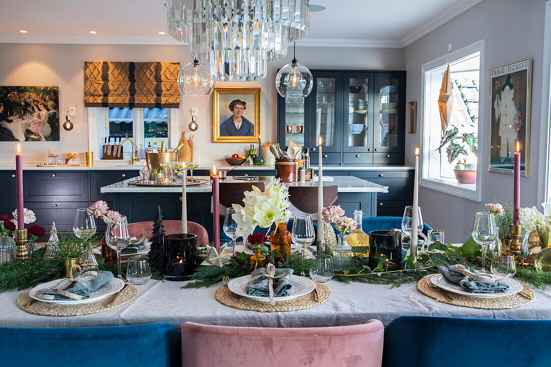 Country-style kitchen, festively laid table with candles