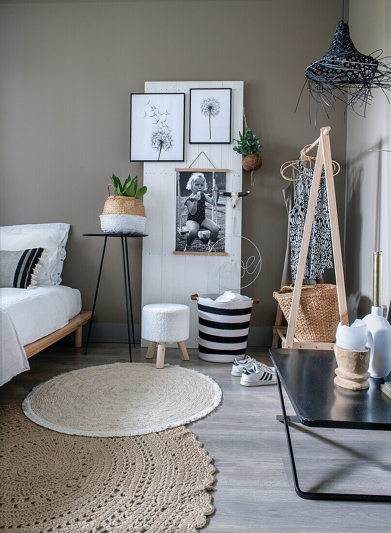 Bedroom with Scandinavian furniture and decorations in natural colors