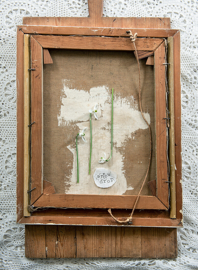 Vintage picture frame with flowers and embroidery snow drop""