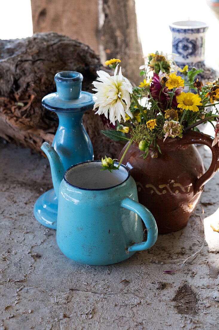 Bouquet of flowers in rustic ceramic pot