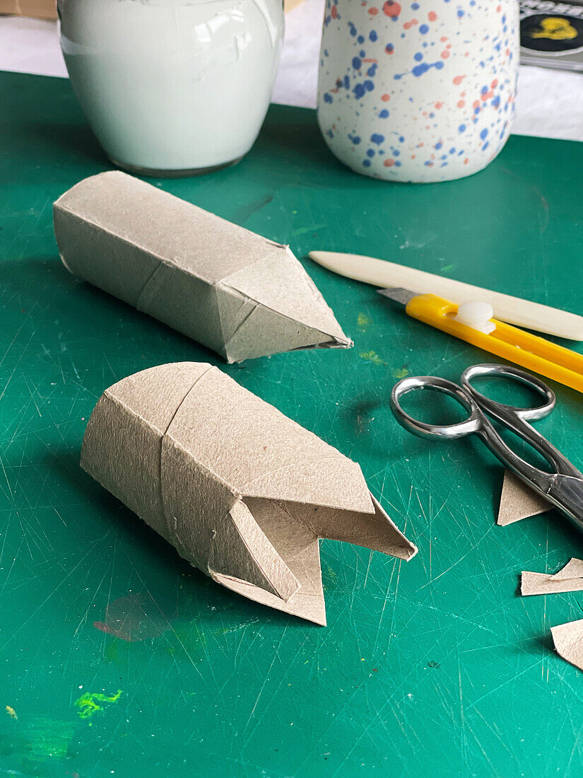 Make your own little houses from loo rolls and book pages