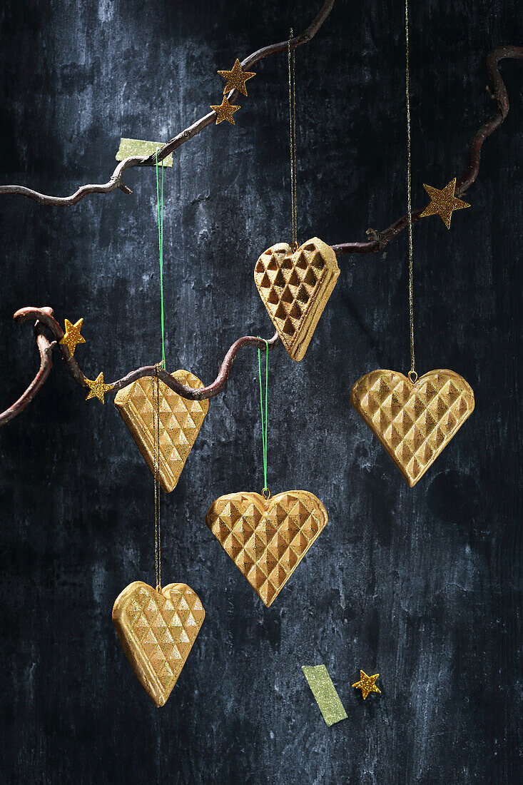 Waffle heart pendants made from modeling clay as a Christmas decoration