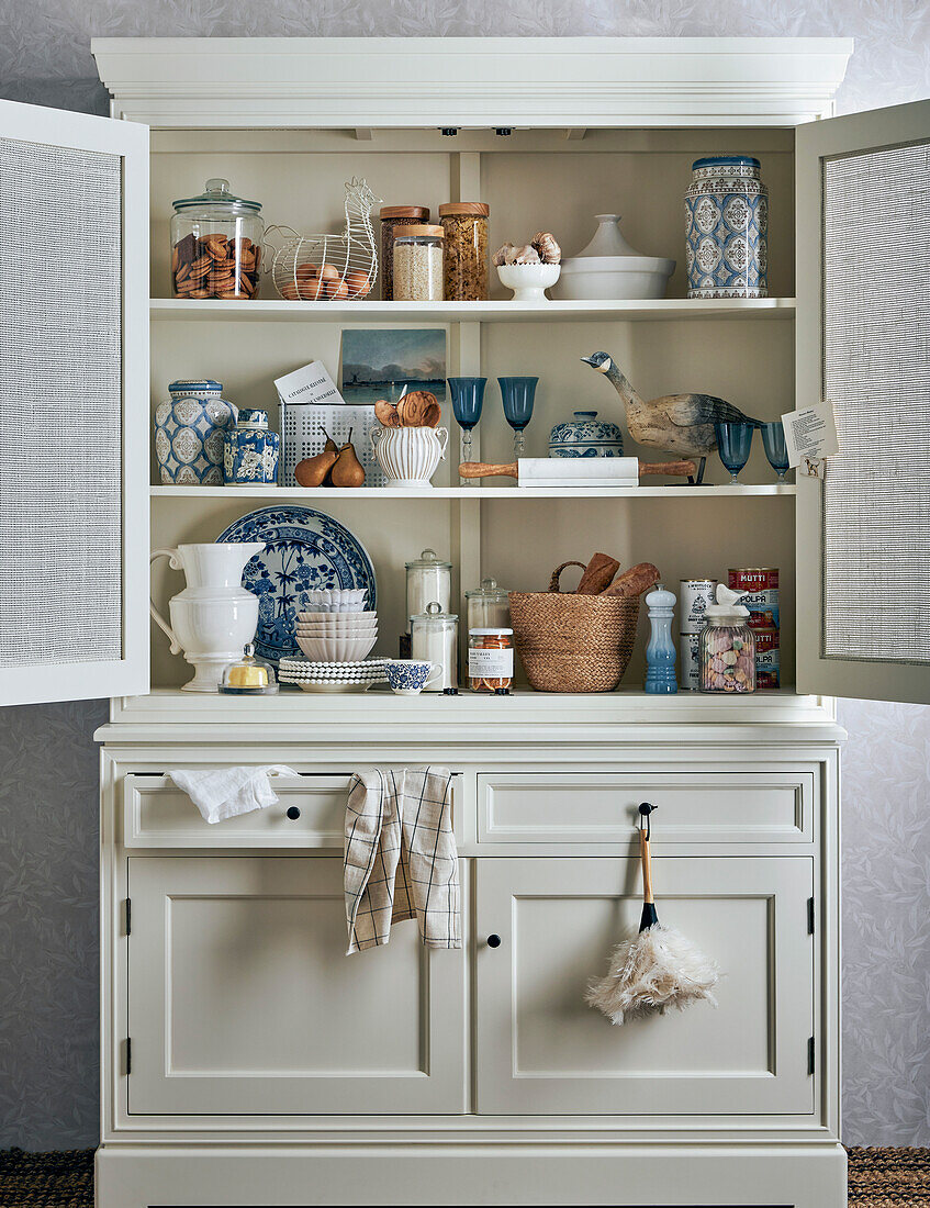 View of the kitchen buffet with crockery and provisions