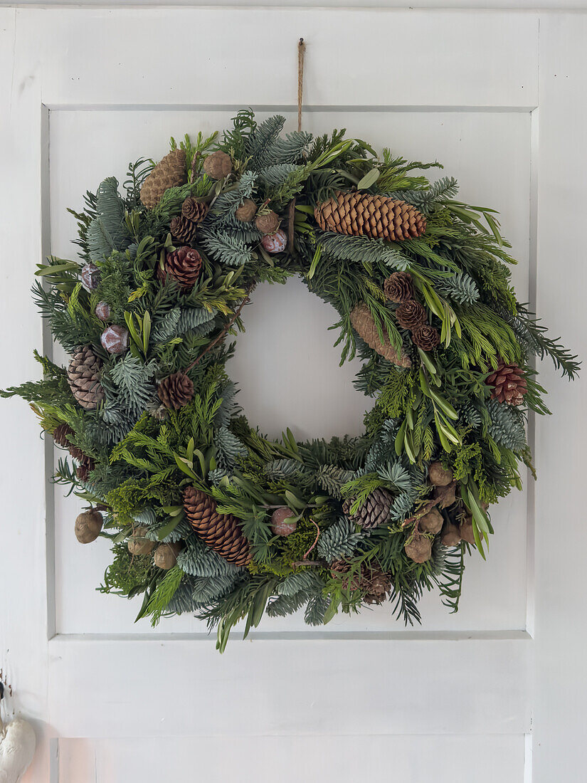 Christmas wreath made from fir branches and cones