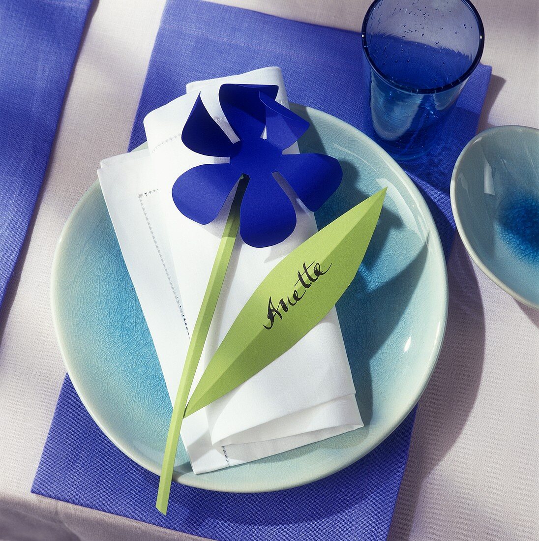 Table setting with windmill as place card