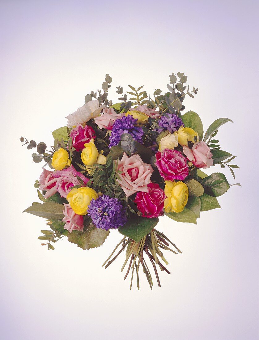 Colourful bouquet of roses, Ranunculus and hyacinths