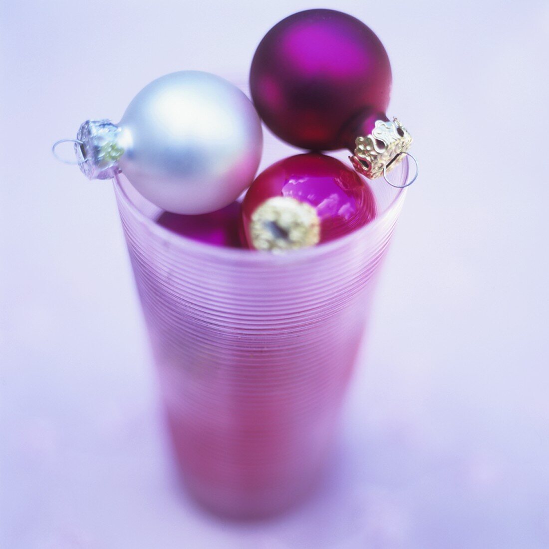 Christmas baubles in a glass