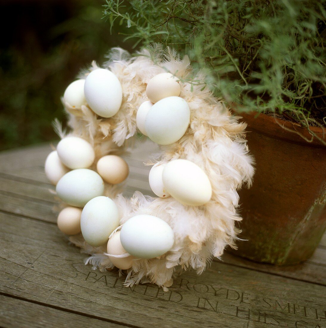 Door wreath with feathers and eggs