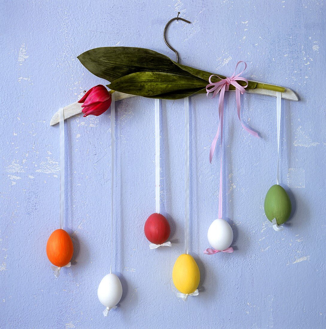 Easter eggs hanging on a coat hanger