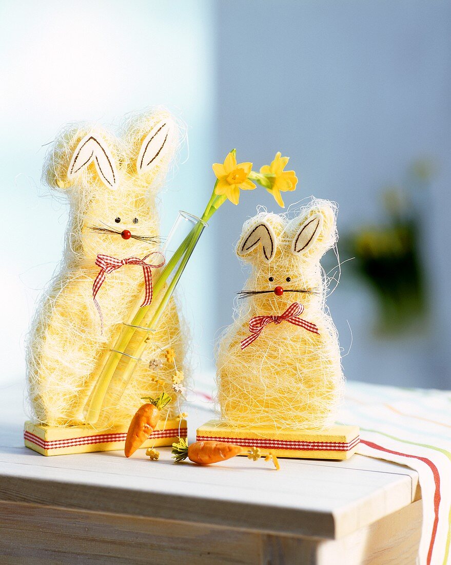 Easter Bunny with narcissi as table decoration