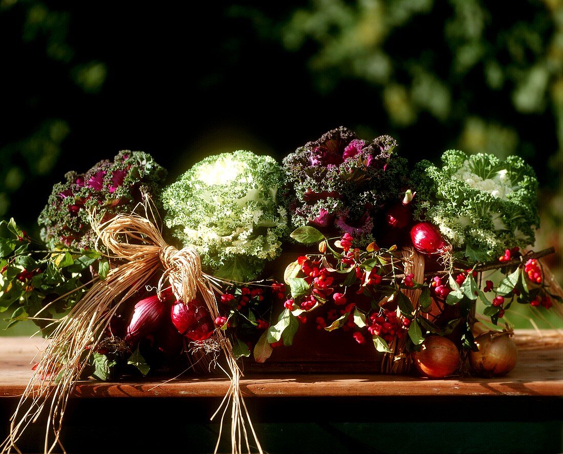 Window box with cabbages and autumn decoration