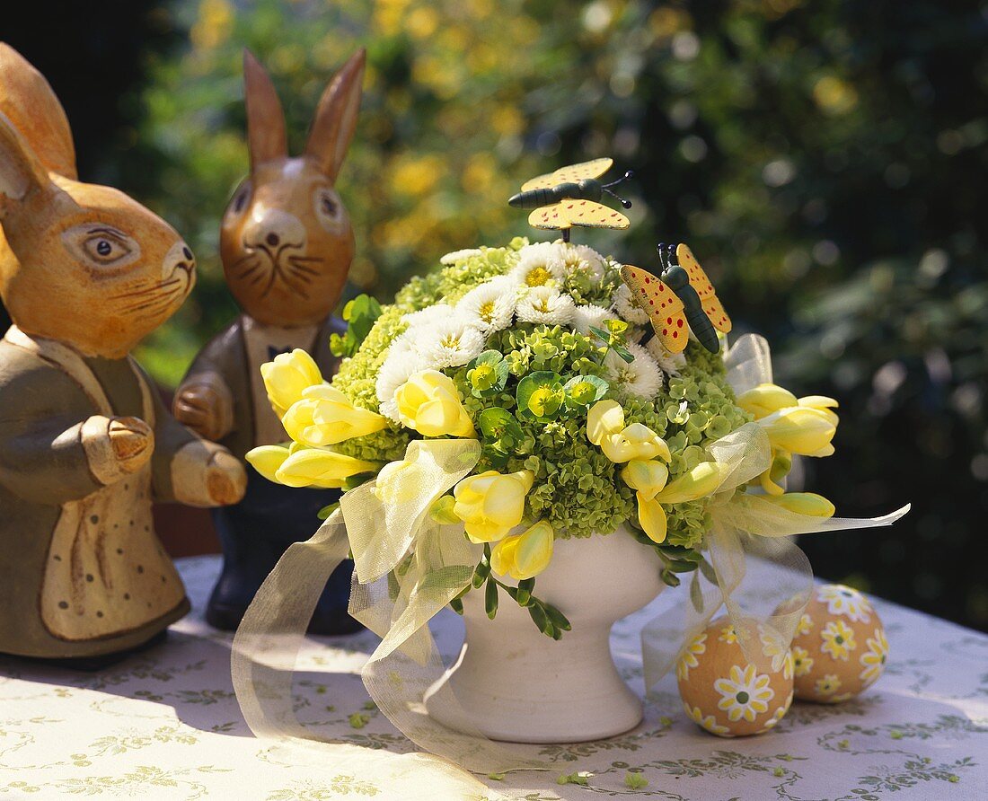 Bouquet of flowers in delicate yellow & white; Easter figures