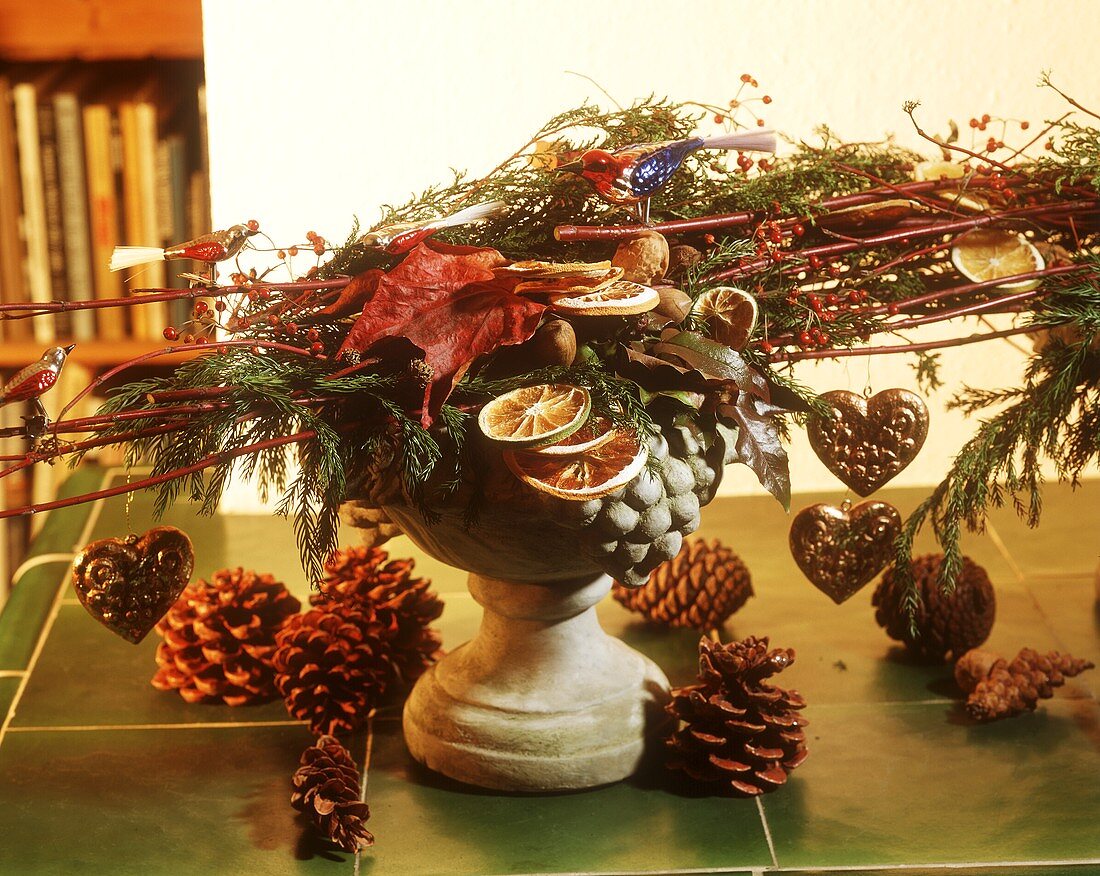 Christmas arrangement of natural materials & glass birds