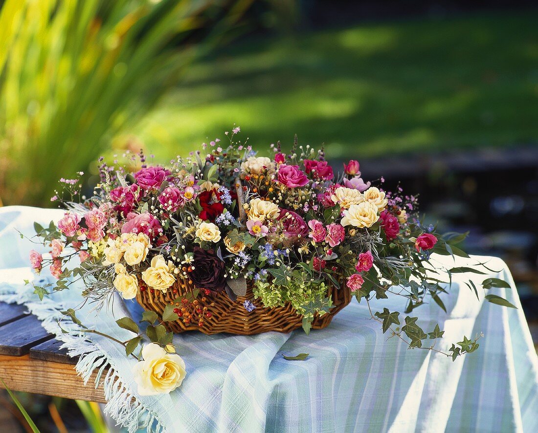 Basket of flowers in pastel shades