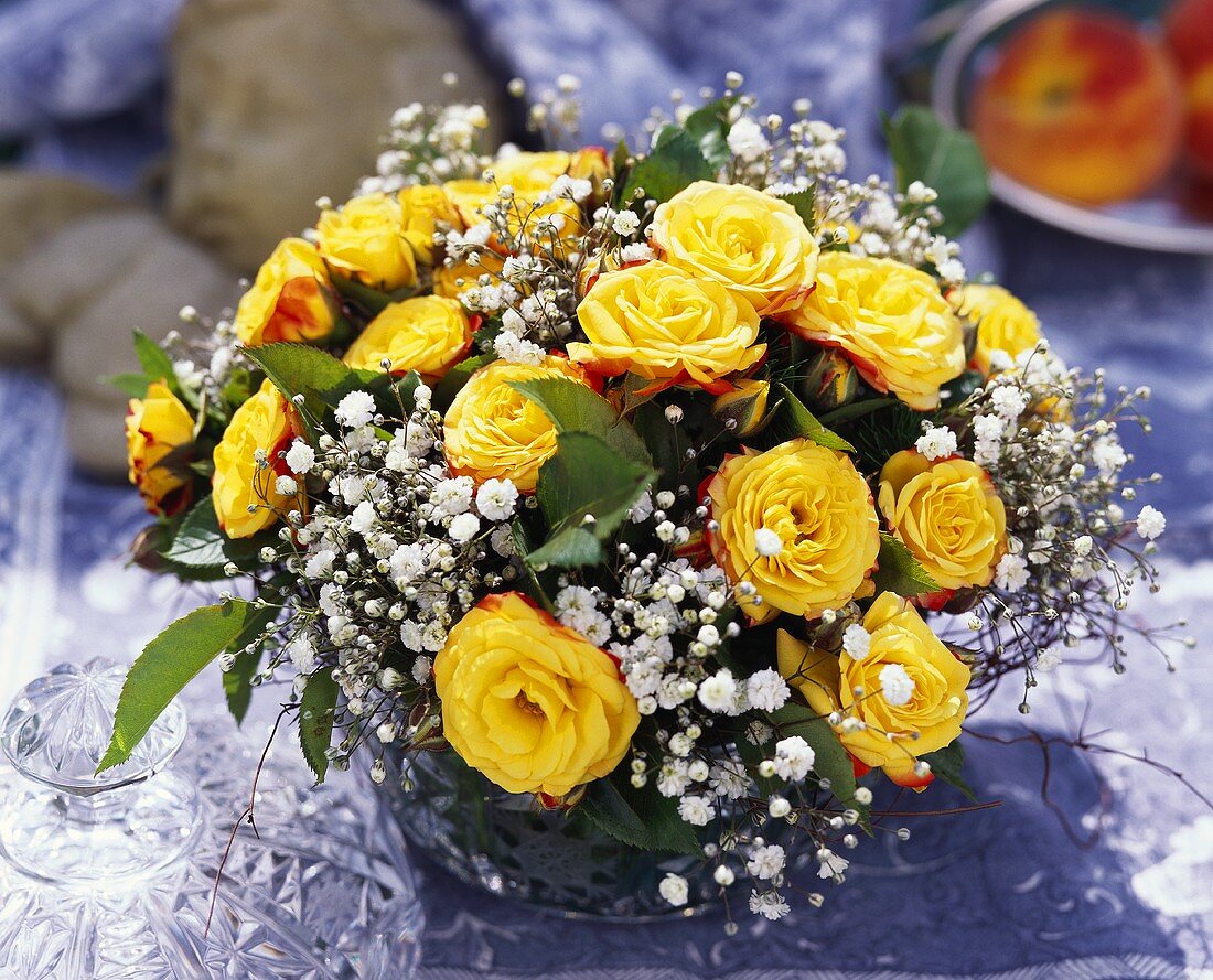 Bouquet of yellow roses with gypsophila