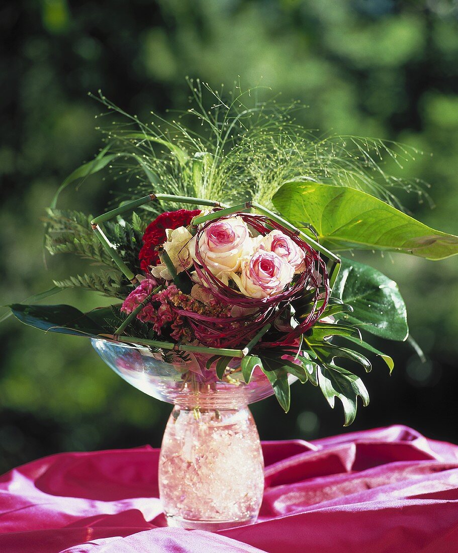 Bouquet of roses, celosia and grasses